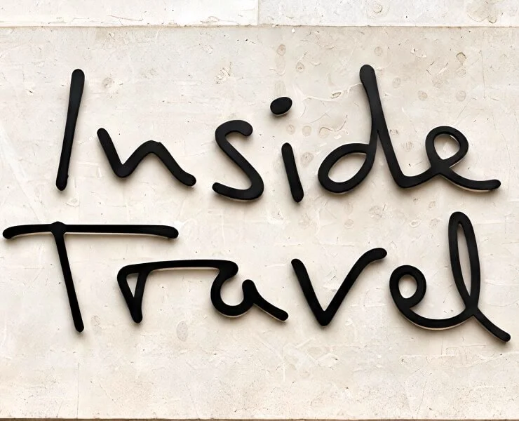 FASTSIGNS® Bristol installed individually mounted stand-off lettering above the main entrance, giving the Inside Travel name a distinctive three-dimensional presence against the natural stone